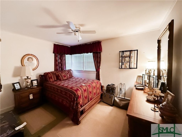 bedroom with ceiling fan, crown molding, and light colored carpet