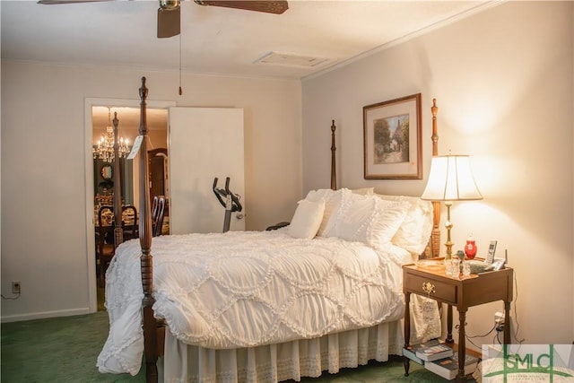carpeted bedroom with visible vents, crown molding, and ceiling fan with notable chandelier