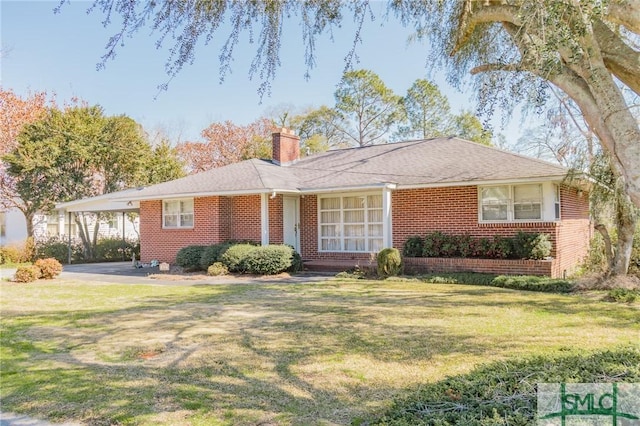 single story home with brick siding, a chimney, and a front lawn