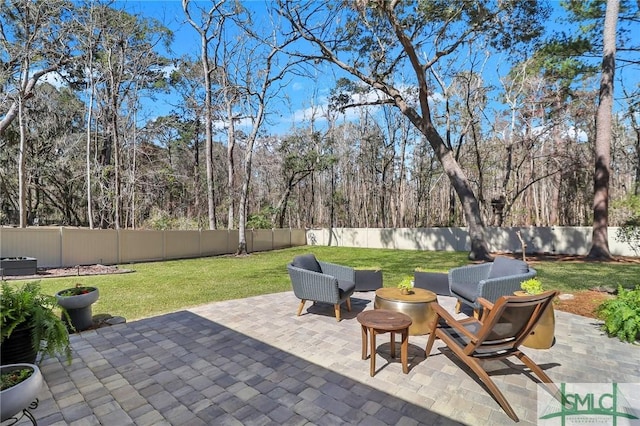 view of patio featuring a fenced backyard