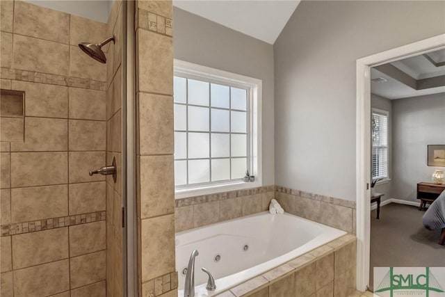 full bathroom with a jetted tub, a stall shower, and ensuite bath