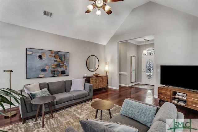 living room featuring baseboards, visible vents, ceiling fan, wood finished floors, and high vaulted ceiling