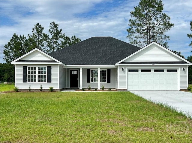 906 Coosa Cv, Ellabell, GA 31308 - view of front of home featuring driveway, an attached garage, roof with shingles, a front yard, and covered porch
