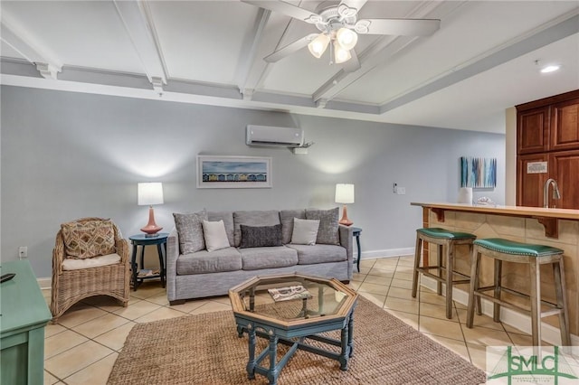 living area featuring light tile patterned floors, beam ceiling, an AC wall unit, and a ceiling fan