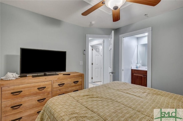 bedroom featuring ensuite bath and ceiling fan