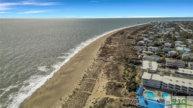 drone / aerial view with a view of the beach and a water view