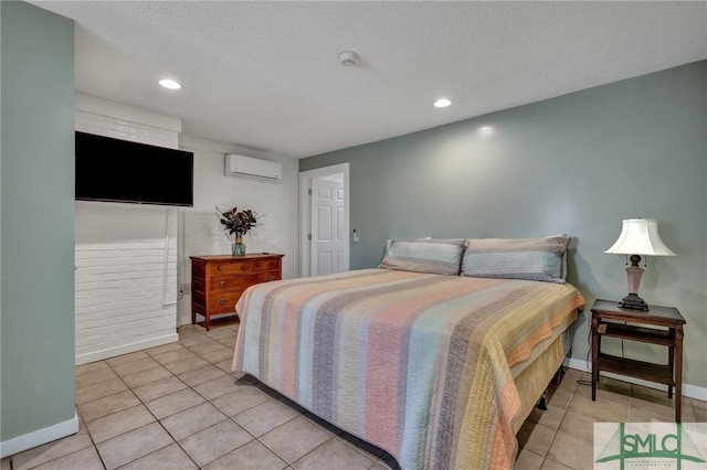 bedroom with recessed lighting, a wall unit AC, baseboards, and light tile patterned floors