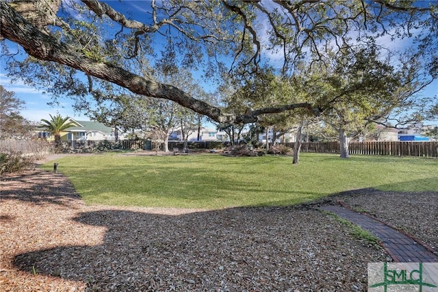 view of yard with fence