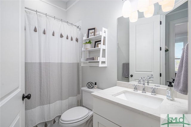 bathroom with vanity, toilet, and a shower with curtain