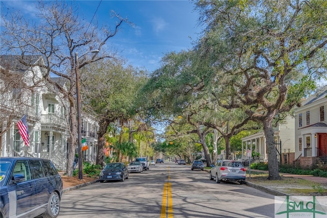 view of street featuring curbs and sidewalks