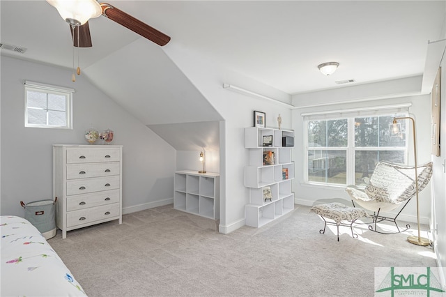 bedroom with carpet floors, baseboards, visible vents, and vaulted ceiling