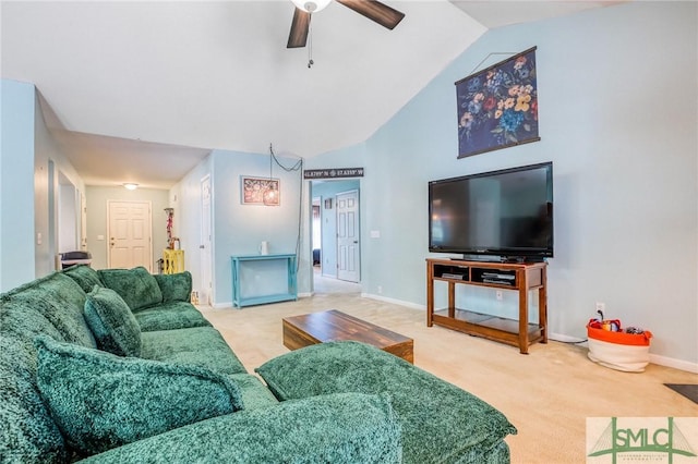 carpeted living area featuring high vaulted ceiling, a ceiling fan, and baseboards