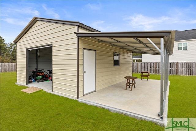 view of outbuilding with fence and an outbuilding