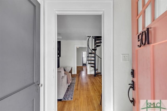 entrance foyer featuring light wood-style flooring and stairway