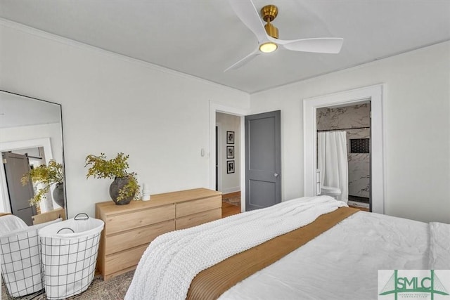 bedroom featuring ceiling fan and ensuite bathroom