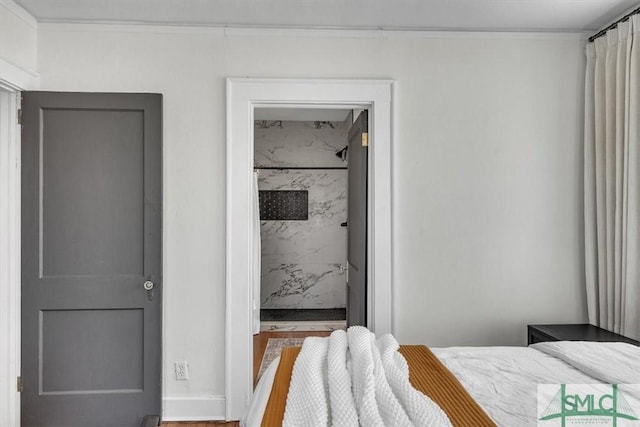 bedroom featuring crown molding