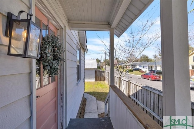 exterior space featuring a residential view and covered porch