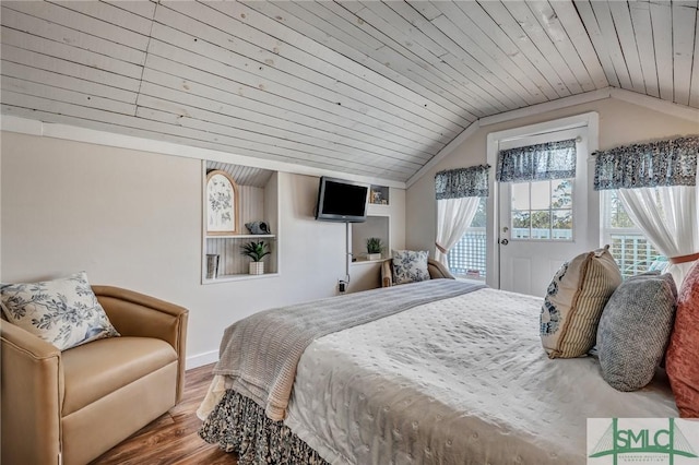 bedroom featuring wooden ceiling, wood finished floors, baseboards, vaulted ceiling, and access to outside