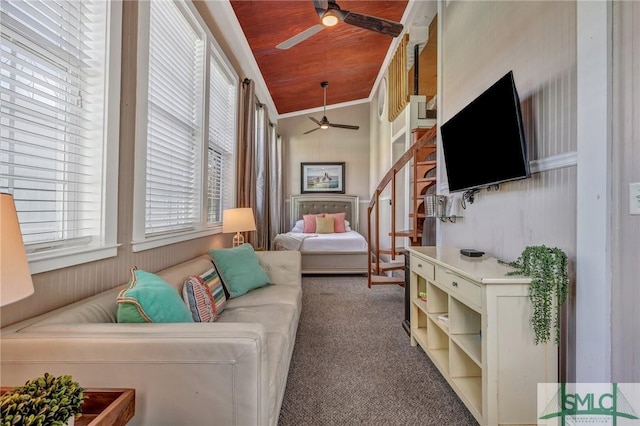 interior space featuring a ceiling fan and wooden ceiling