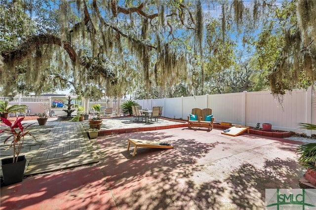 view of patio with a fenced backyard