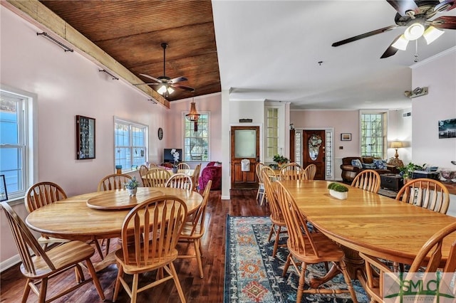 dining space with crown molding, ceiling fan, wood finished floors, wooden ceiling, and baseboards