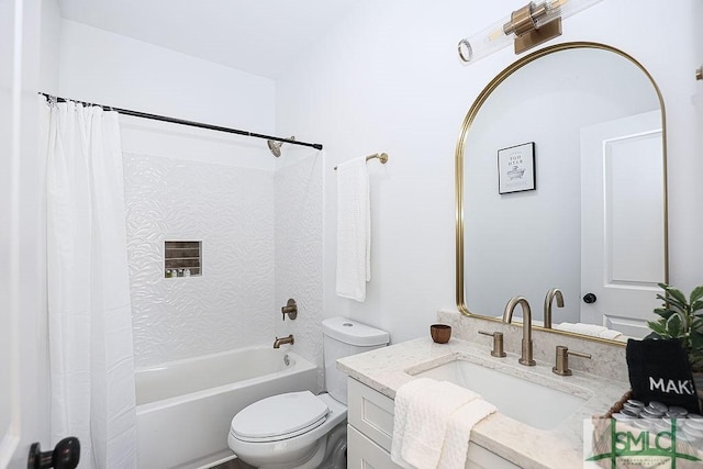 full bathroom featuring shower / bath combo, vanity, and toilet