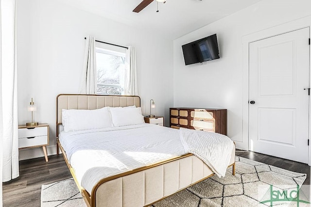 bedroom featuring a ceiling fan and wood finished floors