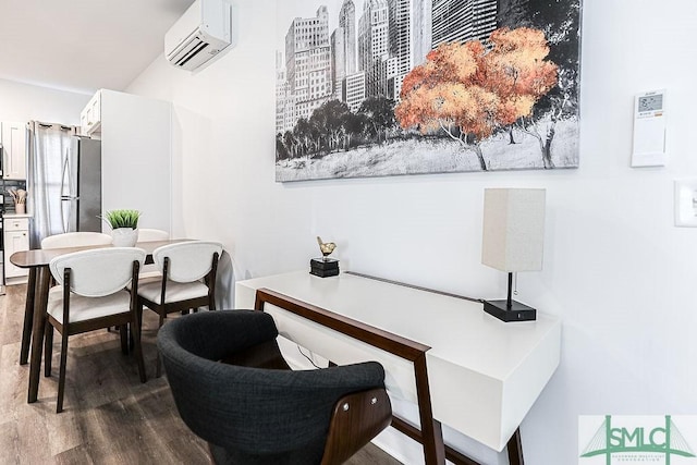 interior space with dark wood-type flooring and a wall mounted air conditioner