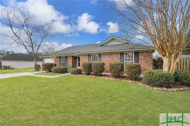 ranch-style home featuring an attached garage, brick siding, fence, concrete driveway, and a front yard