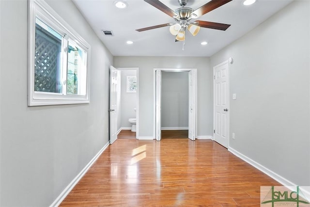 unfurnished bedroom with recessed lighting, visible vents, baseboards, a closet, and light wood-type flooring