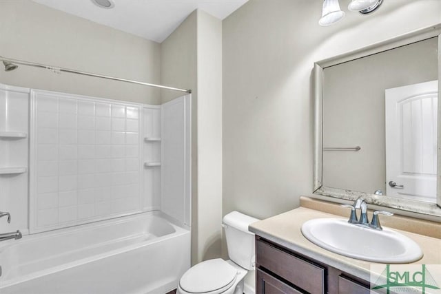 full bathroom featuring vanity, shower / bathing tub combination, and toilet