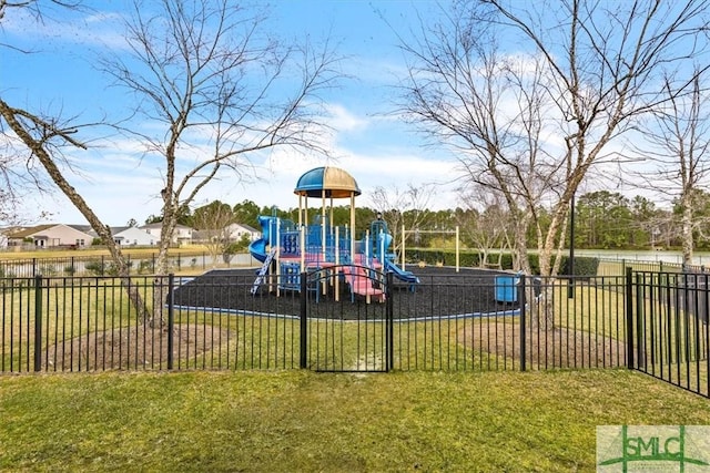 community play area featuring a lawn and fence