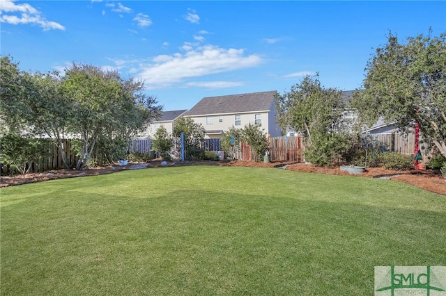 view of yard featuring a fenced backyard