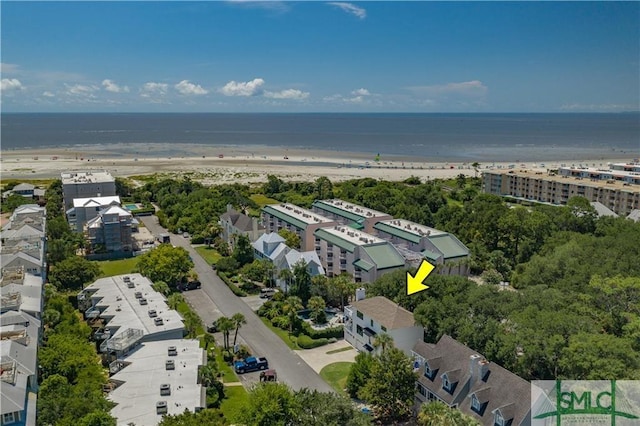 aerial view featuring a water view and a beach view