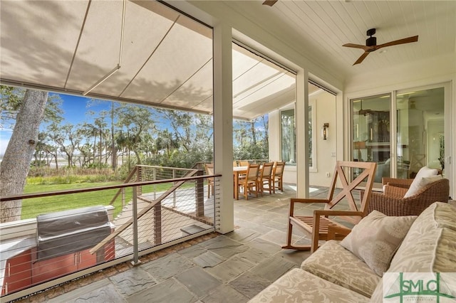 sunroom / solarium with wood ceiling