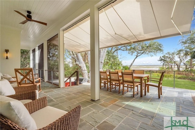 view of patio / terrace featuring an outdoor hangout area, outdoor dining area, and a ceiling fan