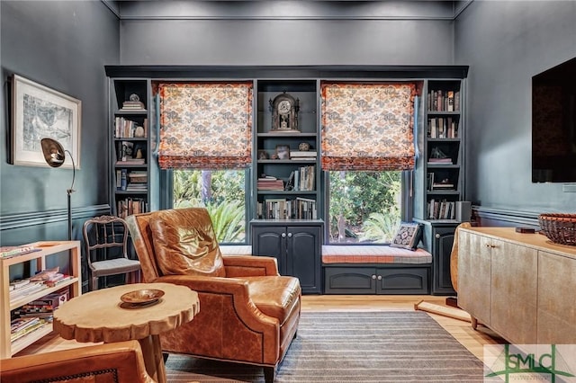 sitting room featuring light wood-style flooring