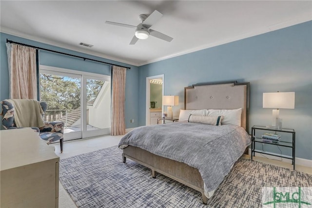 bedroom featuring visible vents, baseboards, ornamental molding, access to outside, and carpet floors