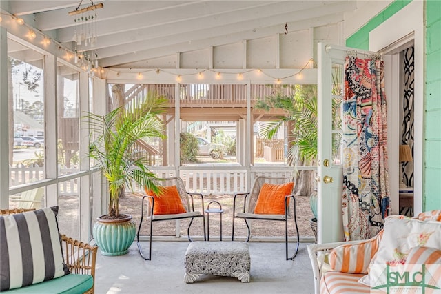 sunroom / solarium with vaulted ceiling