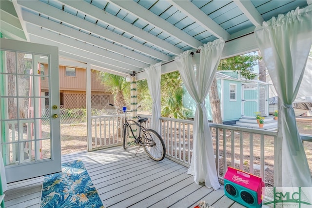 deck featuring an outbuilding