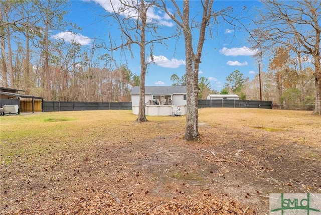 view of yard with a fenced backyard