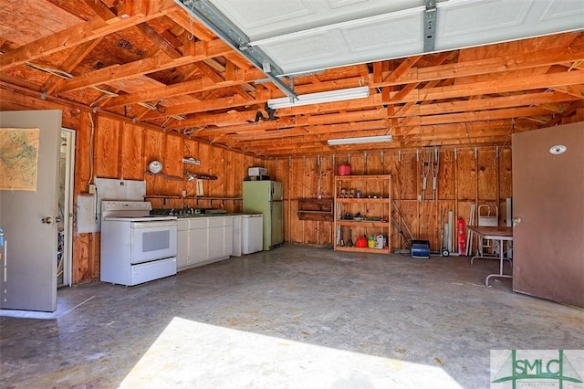 garage with freestanding refrigerator