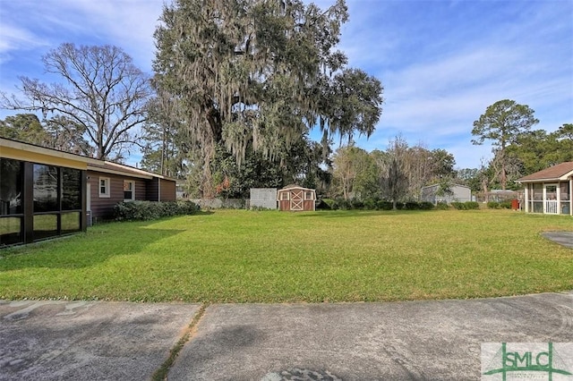 view of yard with a shed and an outdoor structure