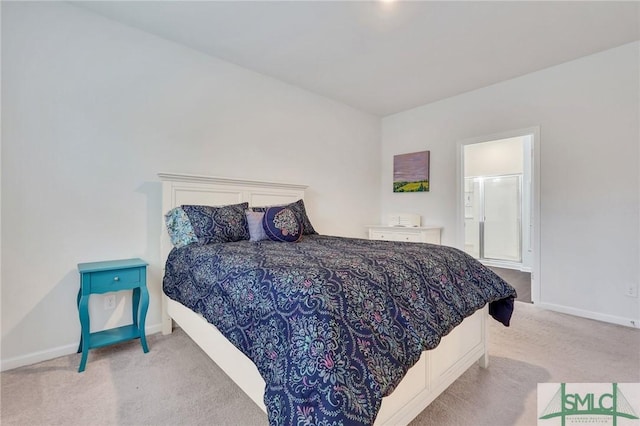 bedroom featuring carpet floors and baseboards