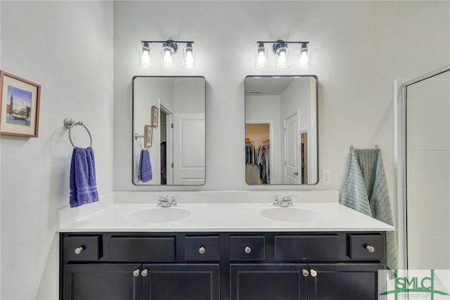 full bathroom featuring a sink and double vanity