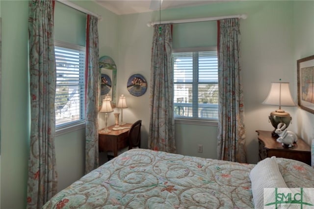 bedroom featuring multiple windows