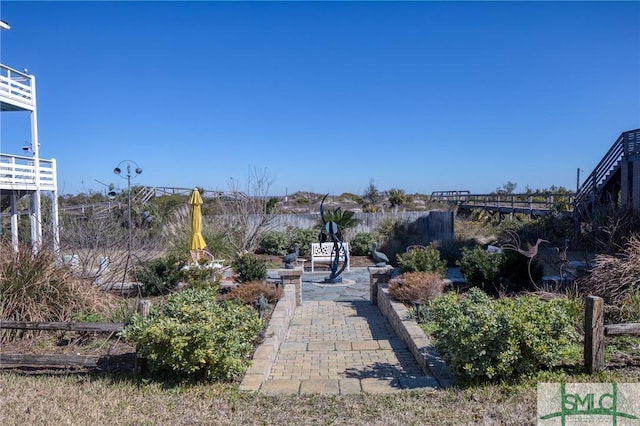 view of property's community with fence