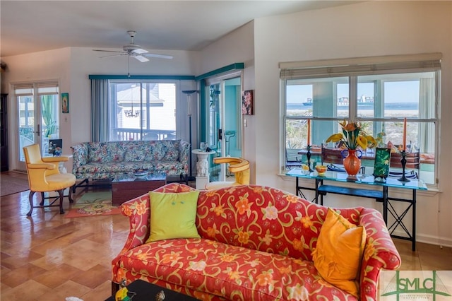 living room featuring a ceiling fan