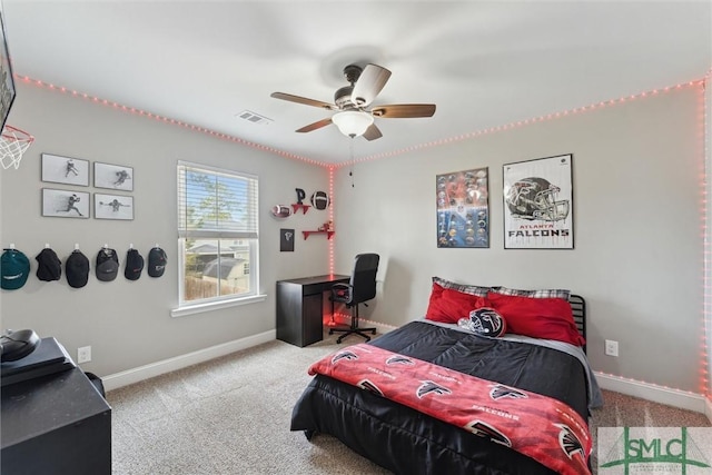 bedroom featuring ceiling fan, carpet floors, visible vents, and baseboards