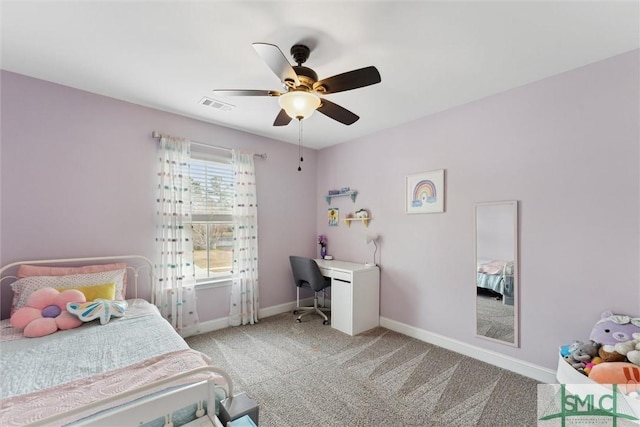 bedroom featuring baseboards, a ceiling fan, visible vents, and light colored carpet